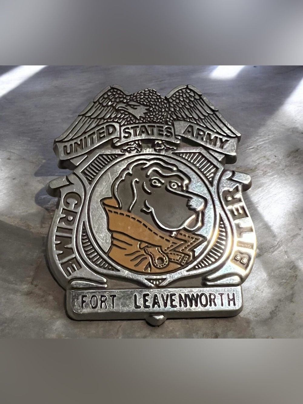 vintage United States Army Fort Leavenworth Crime Biter souvenir badge.